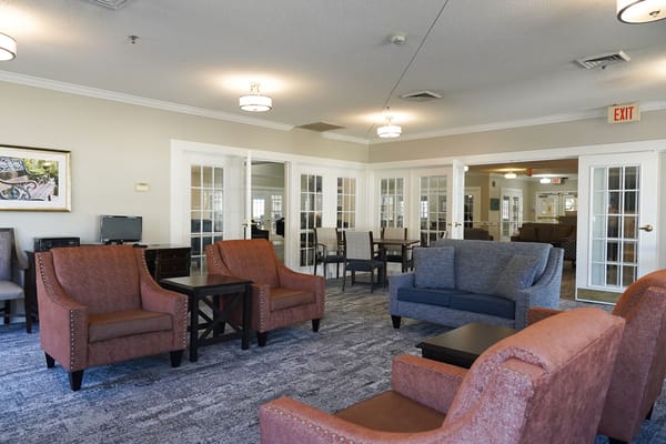 Common area with seating in a warm interior space