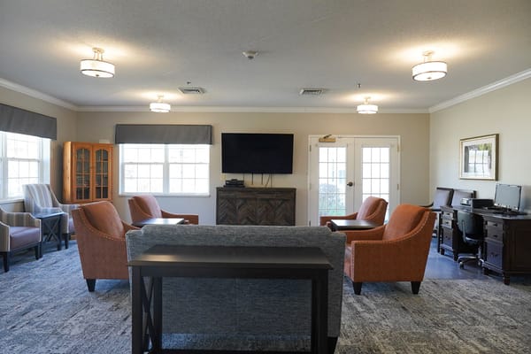 Common area with seating and a television