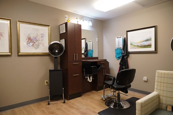 Interior view of a hair salon in a facility