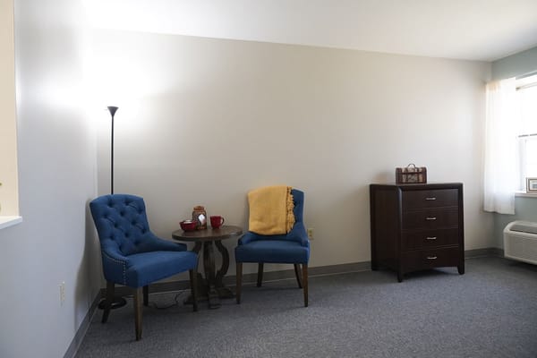 Cozy seating arrangement in a resident's room