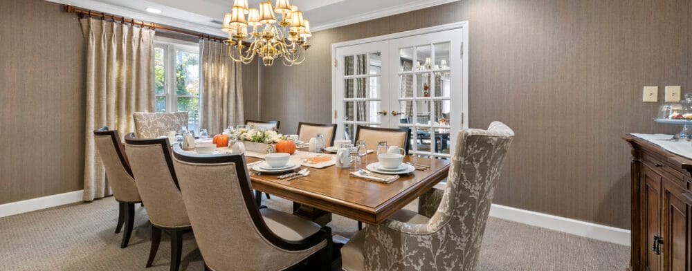 Elegant dining room setup with table and chairs