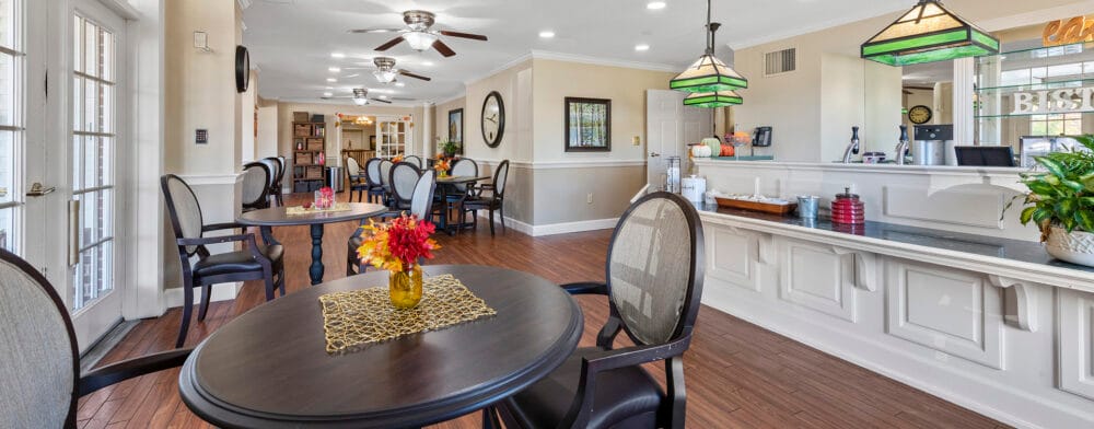 Bright common area with tables and chairs
