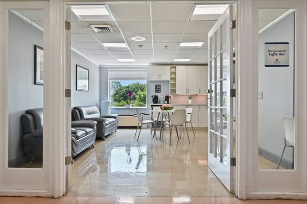 Common area with seating and coffee bar