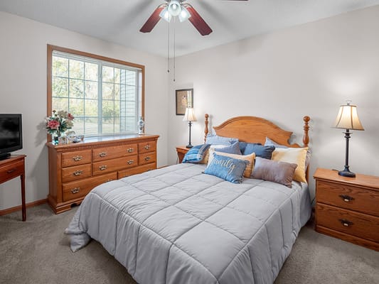 Well-decorated residential room in a senior living facility