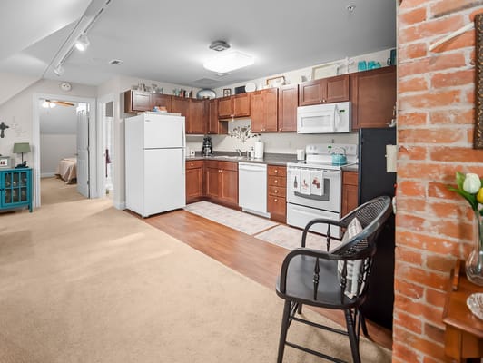 Interior of a cozy kitchen space in a resident unit