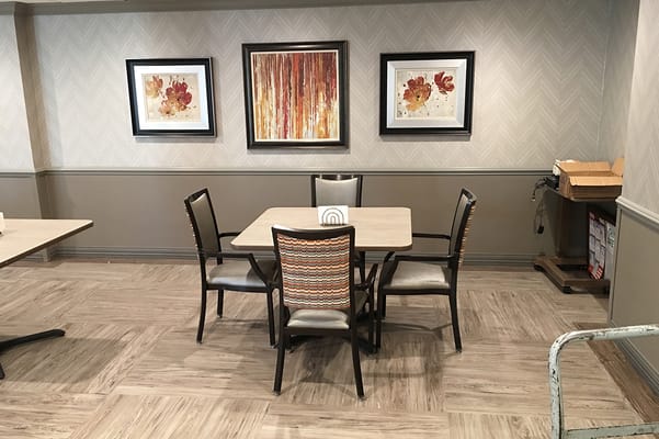 Interior common area with tables and chairs