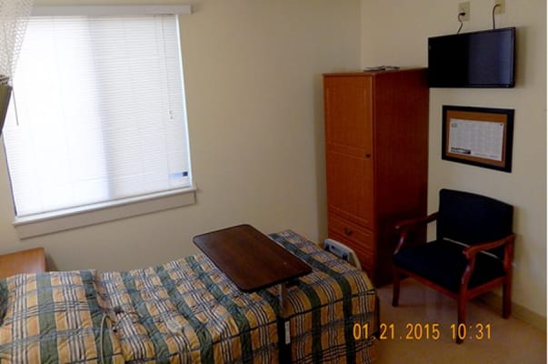 A private resident room with basic furnishings