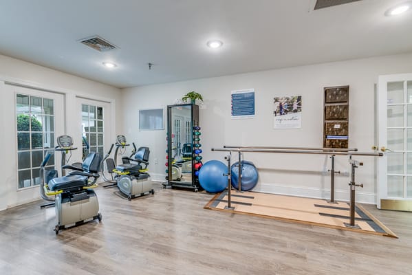 Interior view of a fitness area with equipment