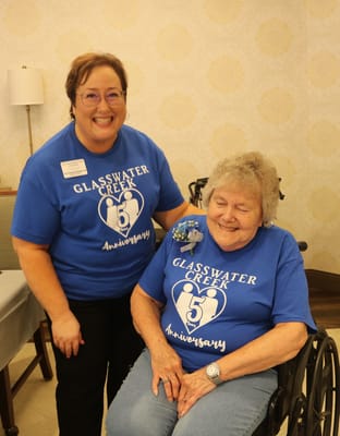 Staff and resident celebrating the 5th anniversary of Glasswater Creek