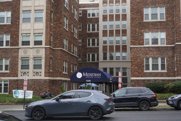 Exterior view of the facility with signage