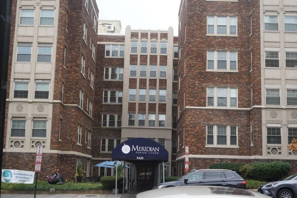 Exterior view of Meridian Senior Living facility entrance