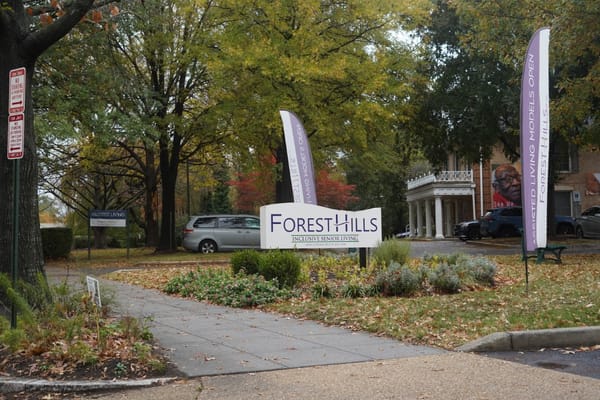 Entrance area with signage for Forest Hills