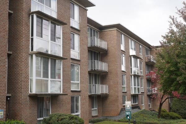 Exterior view of a brick assisted living facility building