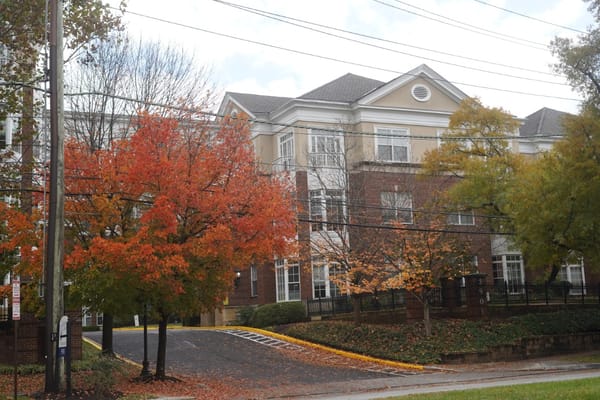Building exterior with colorful trees in autumn