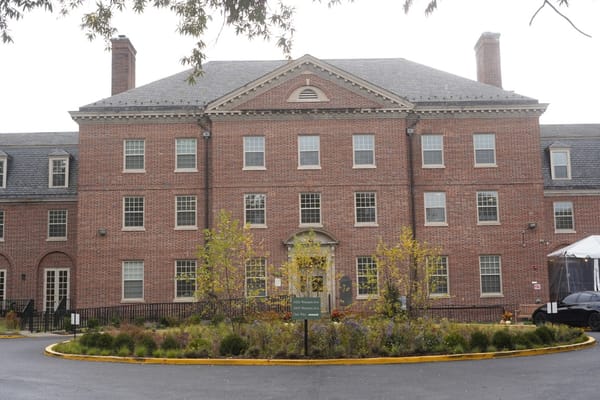 Exterior view of a senior care facility with landscaping