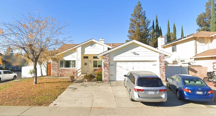 Exterior view of a house with parking area