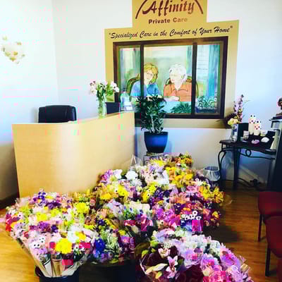 Interior view of a welcoming reception area with flowers