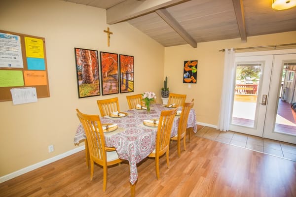 Dining area with a table set for a meal
