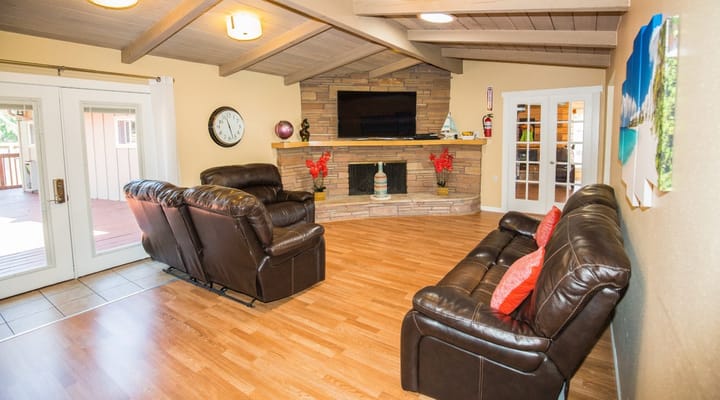 Cozy common area with seating and a television