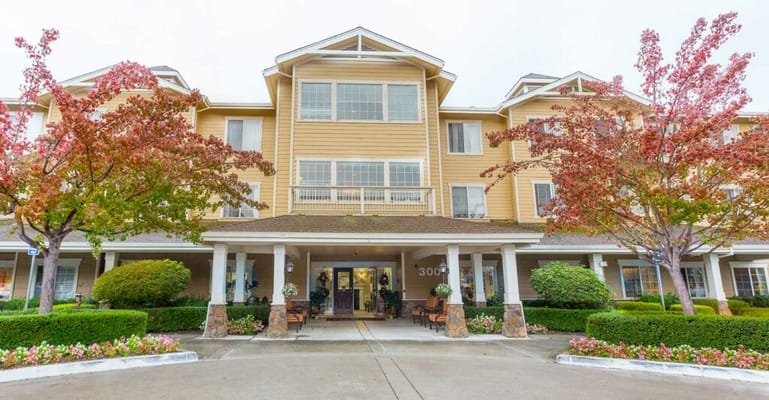 Exterior view of Arbol Residences with colorful landscaping