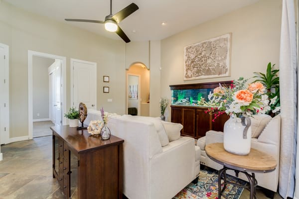 Cozy common area with fish tank and flowers