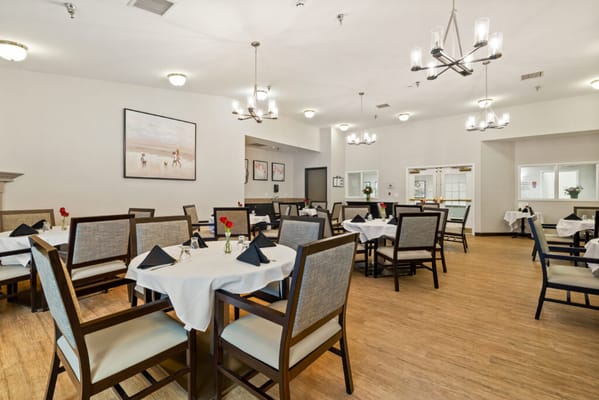 Interior view of the dining room with tables and chairs