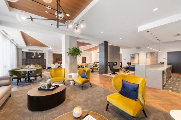 Common area featuring colorful seating and modern decor