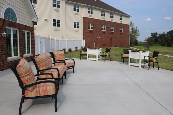 Outdoor seating area with chairs and tables