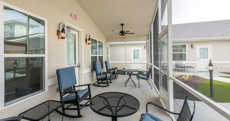 Outdoor sitting area with rocking chairs