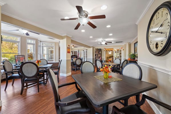 Bright and inviting dining area with tables and decor