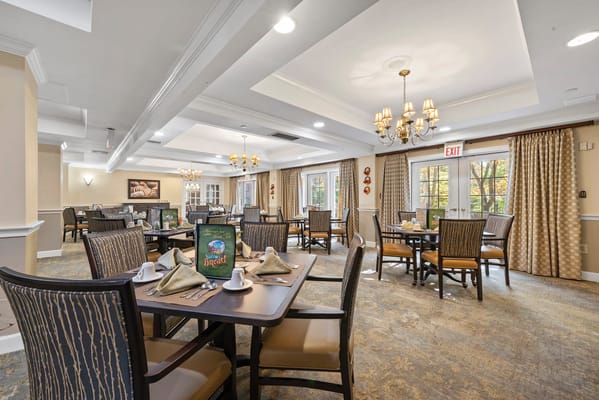 Welcoming dining room with tables set for meals
