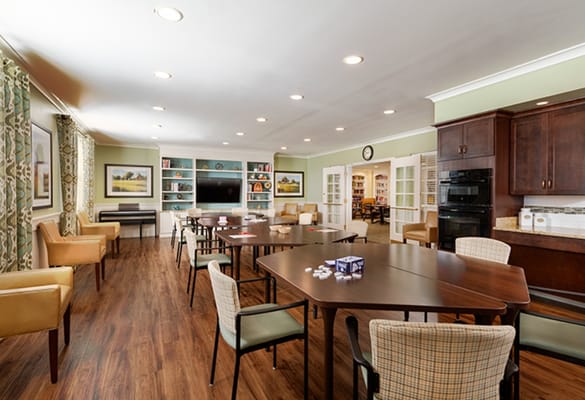 Bright multi-purpose room with tables and chairs