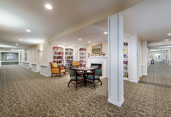 Interior view of a common area with bookshelves