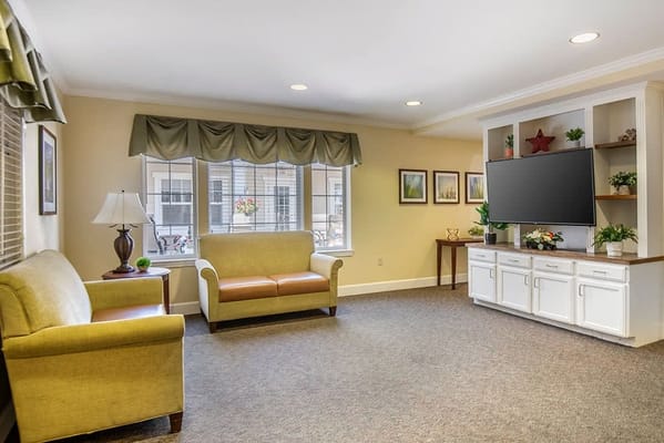 Bright common area with comfortable seating and decor