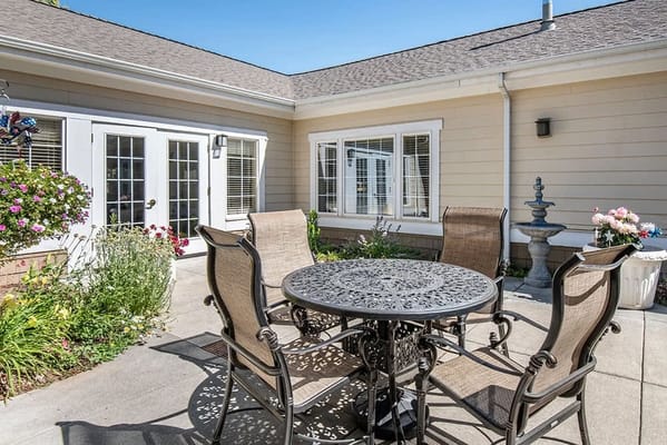 Beautiful outdoor seating area with flowers