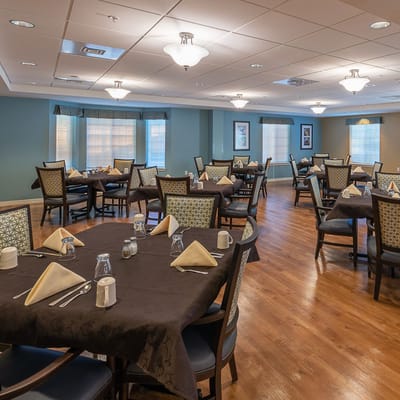 Dining area set up for residents with table settings