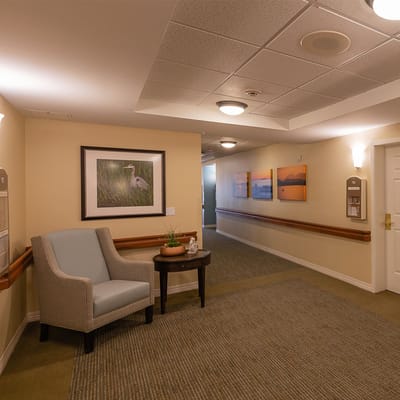 Interior hallway with seating and artwork