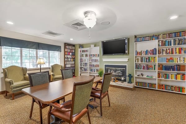 Library area with bookshelves and seating