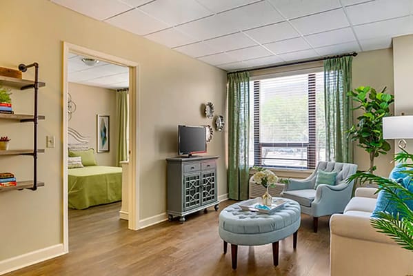 Brightly decorated living area with cozy seating