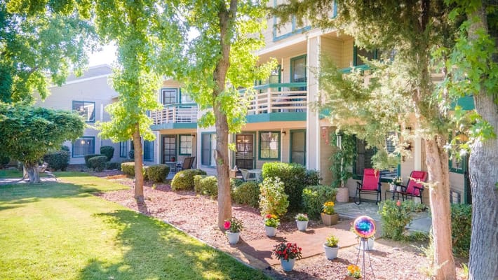 Outdoor view of the facility with landscaping and porches