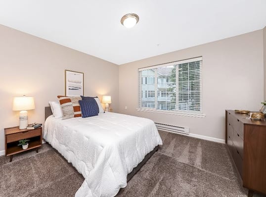 Well-furnished private bedroom in assisted living facility