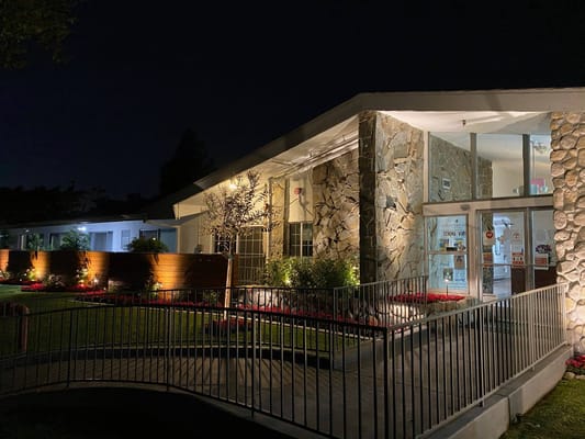 Exterior view of Country Oaks Care Center at night