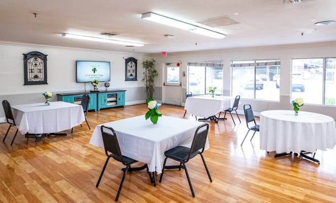 Interior view of a common area with tables and chairs
