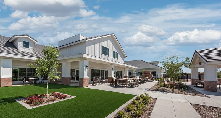 Exterior view of a well-maintained outdoor space with seating.