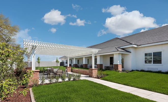 Outdoor space with seating and landscaped area