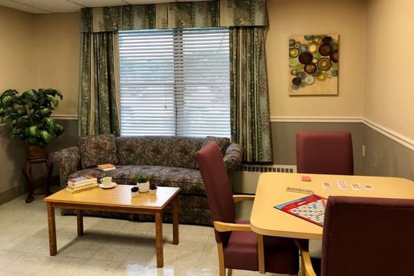 Cozy common area with seating and games