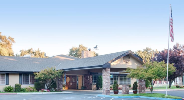 Exterior view of Creekside Center with landscaping