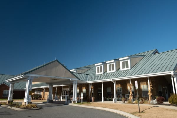 Entrance of the Delaware Veterans Home with a clear blue sky