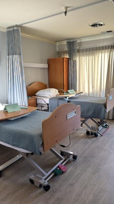 Interior view of a resident room with two beds