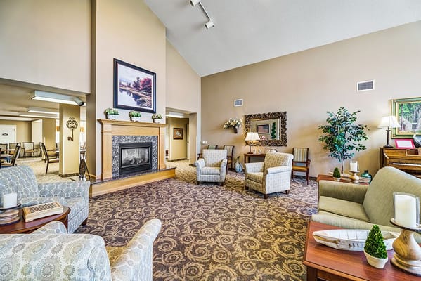 Cozy interior lounge with seating and fireplace